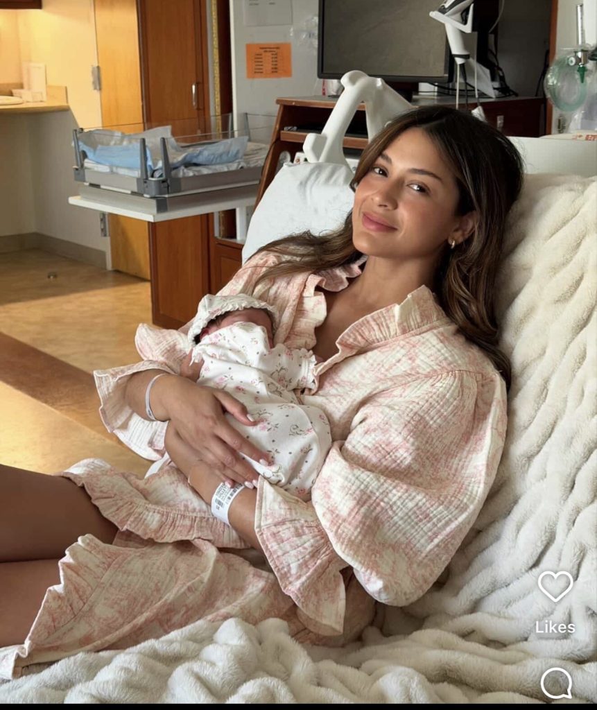 Postpartum mom wearing maxi dress