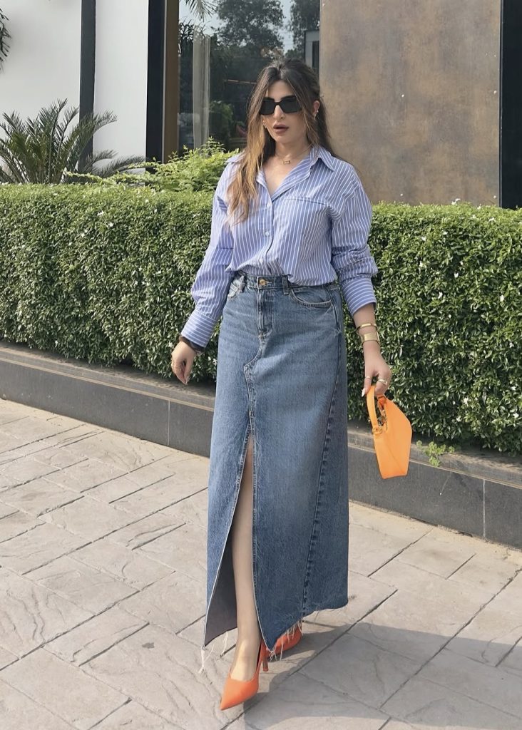 Denim Skirt with a Tucked-In Button-Down Shirt