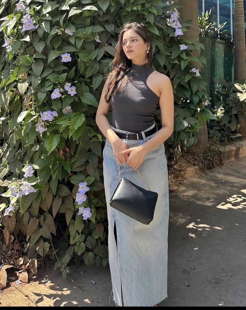 Long denim skirt and platform heels
