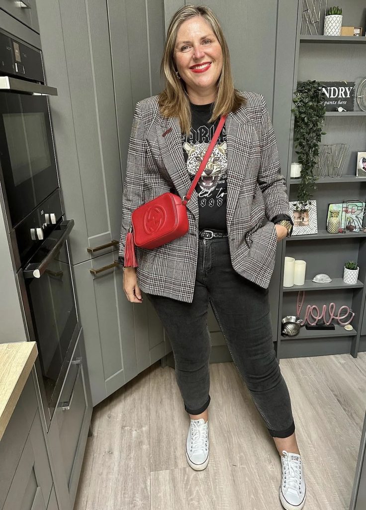 Plaid Blazer With a Black Top and Dark Jeans